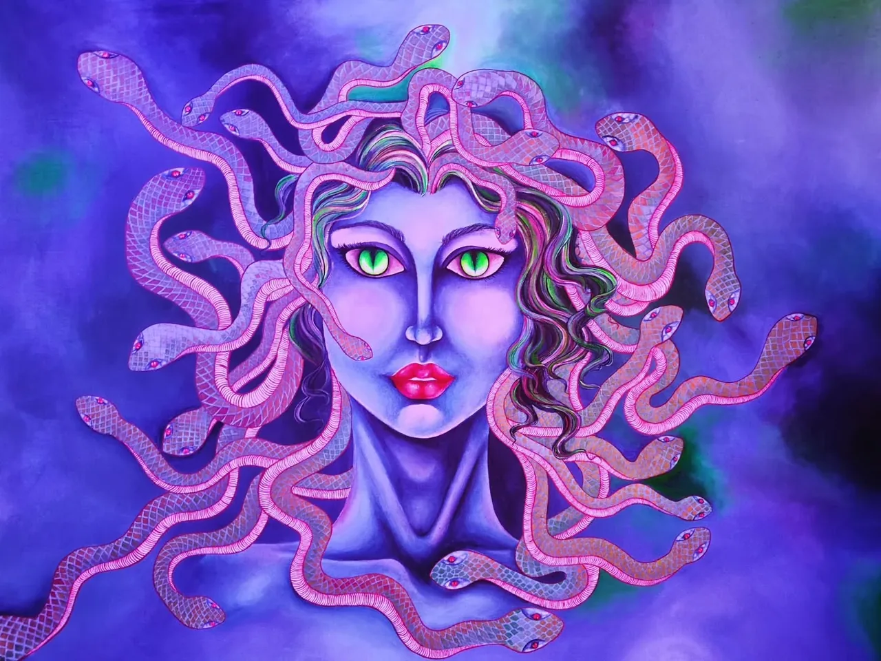 A purple and blue painted face surrounded by pink flowing snake shapes
